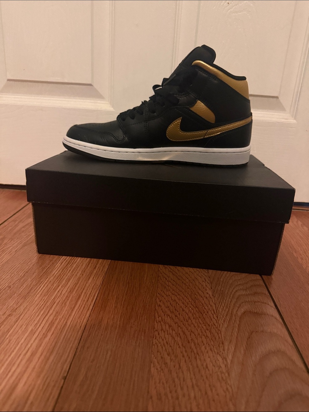 Nike Black and Gold High-Top Sneakers